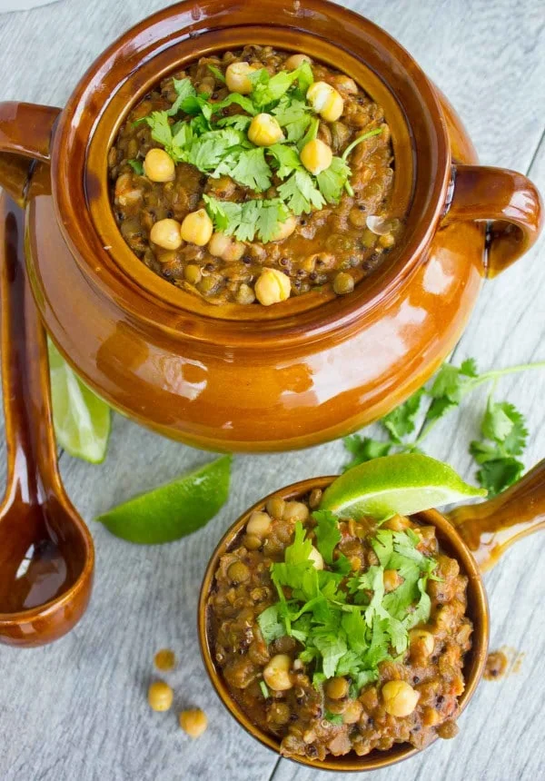 Vegetarian Moroccan Harira Soup served in two brown soup bowls