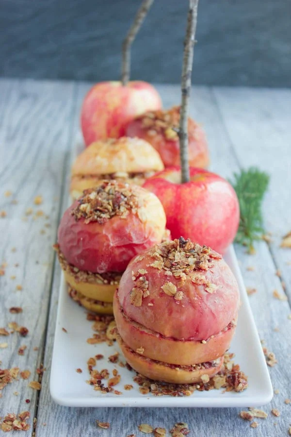 Baked Apples with Granola Crunch on a white plate
