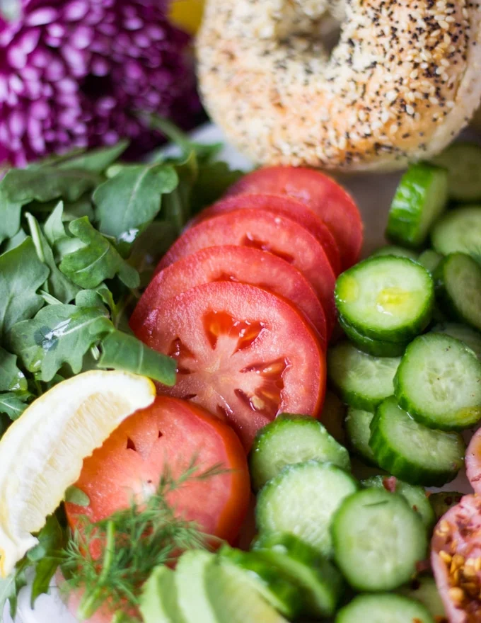 sliced tomatoes and cucumbers on a platter