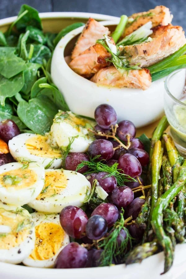Side view of Salmon Asparagus Sweet Potato Nicoise Salad
