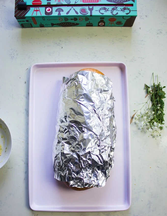 Wrapped up loaf of bread ready to bake