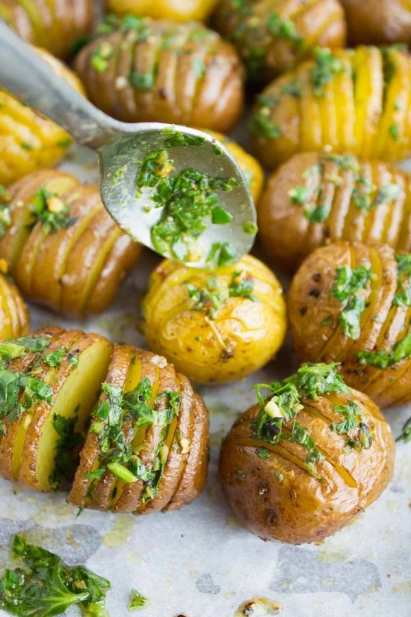 Herb Roast Potatoes drizzled with herb butter