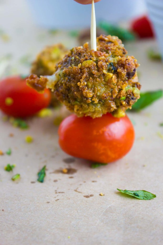close up of toothpick with caprese bites