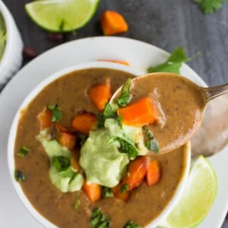 Sweet Potato Black Bean Soup. Quick, easy, creamy and super satisfying soup to unwind with! Twisted with some sweet potatoes, avocado crema and more sweet potato cubes--this soup is Vegan and so GOOD for you! foodallianceblog.com