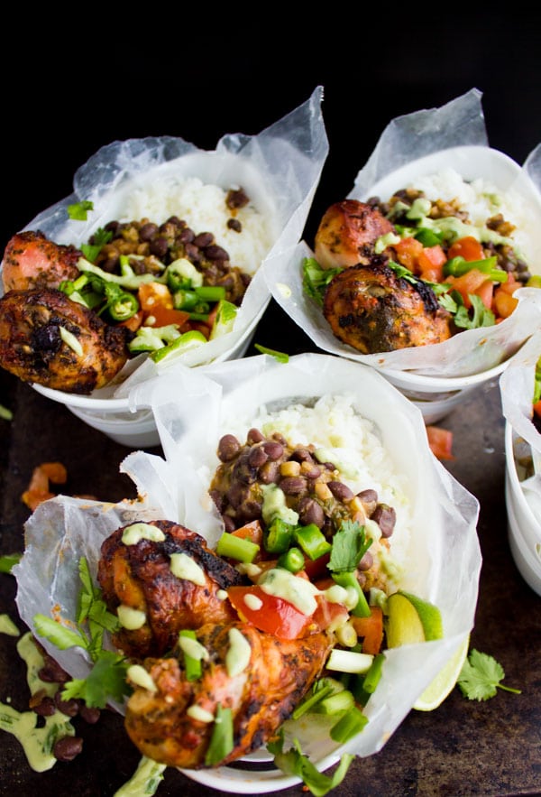 three servings of Cuban Black Beans Chicken and Rice in take-out cups