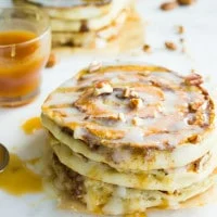 Banana Swirl Cinnamon Roll Pancakes. Here's the BEST pancake you'll ever make--fluffy, light as air pancakes with a banana pecan cinnamon swirl! Easy, Scrumptious cross between CINNAMON ROLLS+BANANA BEAD+PANCAKES..Get the Step by Step recipe and photos! foodallianceblog.com