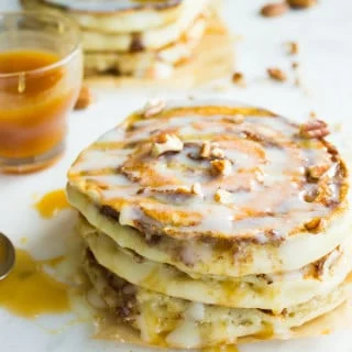 Banana Swirl Cinnamon Roll Pancakes. Here's the BEST pancake you'll ever make--fluffy, light as air pancakes with a banana pecan cinnamon swirl! Easy, Scrumptious cross between CINNAMON ROLLS+BANANA BEAD+PANCAKES..Get the Step by Step recipe and photos! foodallianceblog.com