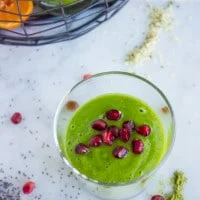 Hemp Matcha Kale Power Boosting Smoothie sprinkled with pomegranate seeds