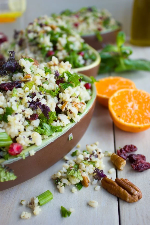 Mixed Grain Kale Citrus Salad. A zesty vibrant fresh salad you can serve warm, cold, picnic day, busy day or for lunch next day! Perfectly Vegan and loaded with grain goodness! Get the recipe for this salad and a citrus salad dressing you'll make over and over again! foodallianceblog.com