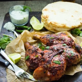 Quick Roast Tandoori Chicken. This absolutely the ONE and only way to make a tandoori chicken without marinating and long hours of waiting! No special ovens needed, just a LOAD of flavors and a secret tip to speed p the roasting! Get this all time favorite recipe and see for yourself! foodallianceblog.com