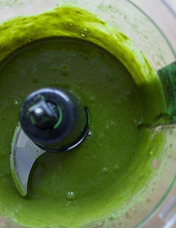 banana, vanilla, matcha powder and nut butter blended in a food processor