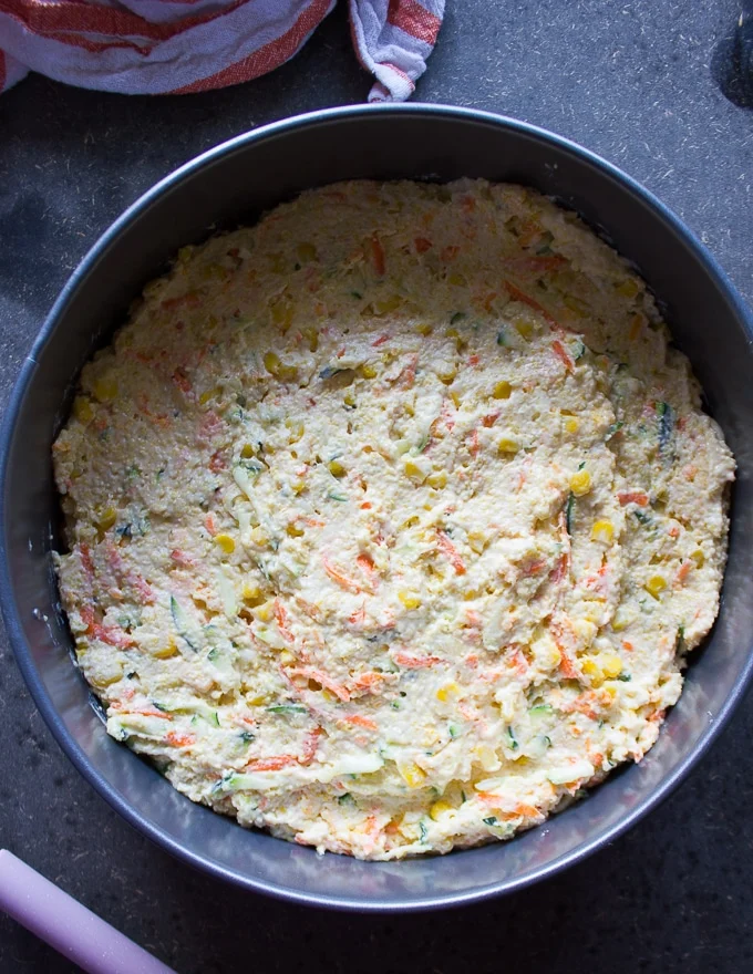 cornbread batter in the pan ready to go in the oven