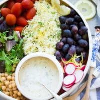 Lemon Cauliflower Rice Salad With Yogurt Dressing. Quick, easy and super delicious salad made with lemon cauliflower rice, plenty of veggies, fruits and goodies. A bright herb yogurt sauce drizzled on top to brighten the salad --a real crowd pleaser and a favorite for potluck! foodallianceblog.com