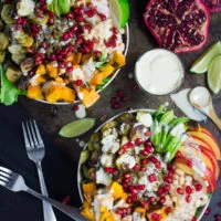 Lentil Fall Harvest Buddha Bowl. This easy, crazy delicious Buddha goodness bowl is all you need to make your life happier! Loaded with greens, lentils, navy beans, apples, avocado, sweet potatoes, sprouts, pomegranate arils--all drizzled with the perfect tahini sauce! Get this recipe and tips for Buddha bowl perfection. foodallianceblog.com