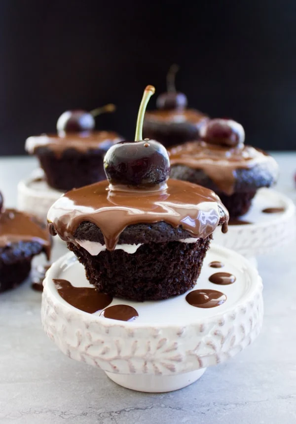 Easy Mini Black Forest Cupcakes on little cake stands