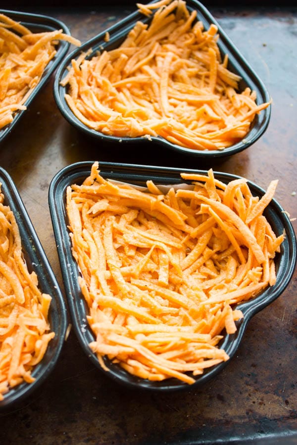 shredded sweet potato pressed into heart-shaped molds to form crust for baked eggs