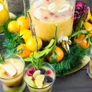 Fruity Non Alcoholic Sangria and Orange Salmon Bites Party. A super refreshing, replenishing Sangria that's fortified with a secret ingredient, plenty of fresh fruits and deliciousness! Parked with Orange Salmon Broccoli bites, plus get ideas for a warm cozy winter party with plenty of easy citrus centrepieces! foodallianceblog.com