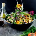 Sweet Persimmon Apple Kale Salad Recipe. Festive, rainbow goodness salad that's quick, light as air, crunchy, sweet and vegan. Dressed up with a sweet secret ingredient dressing! foodallianceblog.com
