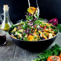 Sweet Persimmon Apple Kale Salad Recipe. Festive, rainbow goodness salad that's quick, light as air, crunchy, sweet and vegan. Dressed up with a sweet secret ingredient dressing! foodallianceblog.com