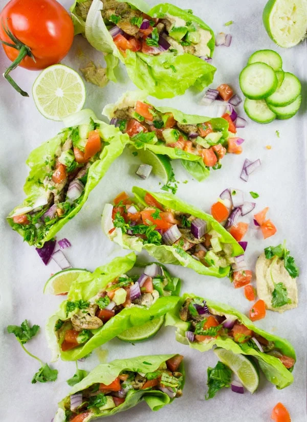 Chicken Shawarma, diced tomatoes and freshly chopped herbs stuffed into crisp lettuce cups