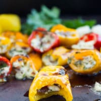 Mini Zesty Feta Stuffed Peppers. The freshest, easiest and quickest appetizer you'll ever make! Perfect for BBQ season or made in the broiler! Sweet, salty, spicy and utterly delicious. foodallianceblog.com
