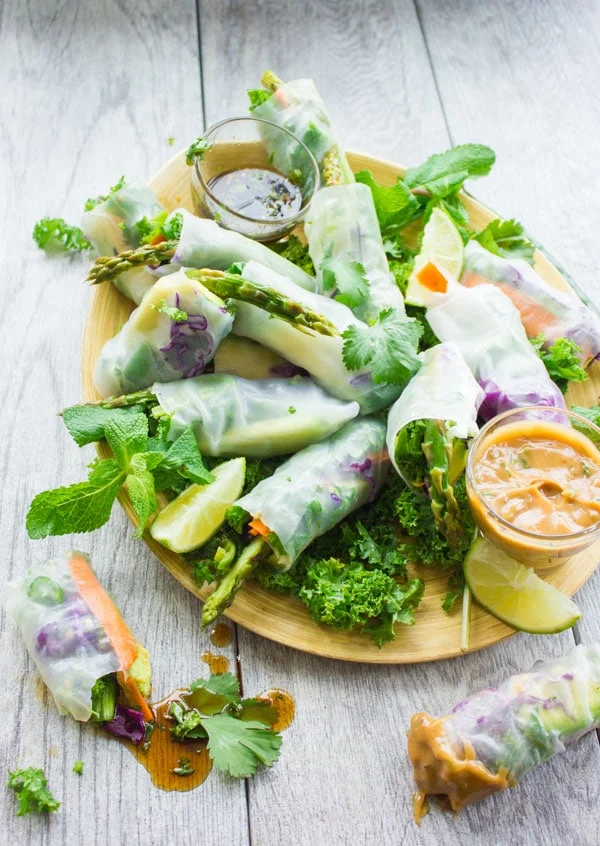Rice Paper Rolls arranged on a plate with Two Dipping Sauces on the side