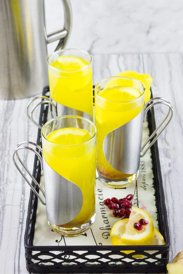 Soothing Lemon Ginger Turmeric Drink. The ultimate soothing and boosting drink to get you going! It's like a lemon ginger tea with the benefits of turmeric! get the recipe at foodallianceblog.com