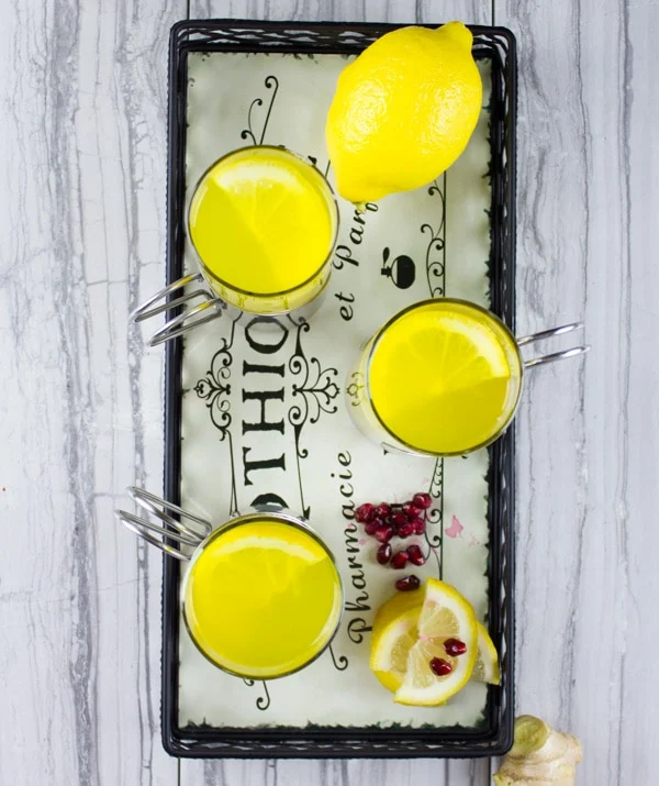 Soothing Lemon Ginger Turmeric Drink. The ultimate soothing and boosting drink to get you going! It's like a lemon ginger tea with the benefits of turmeric! get the recipe at foodallianceblog.com