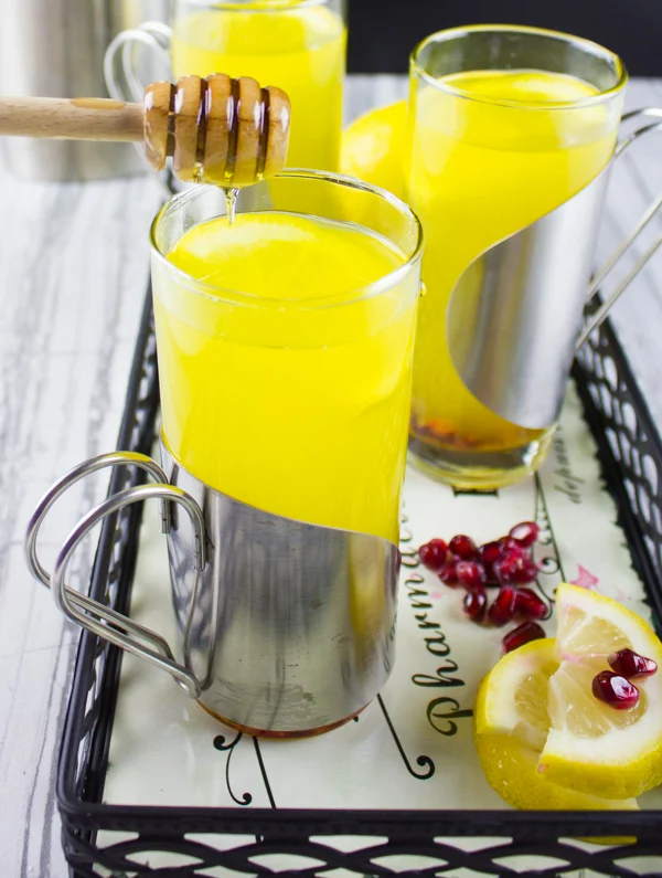 Soothing Lemon Ginger Turmeric Drink. The ultimate soothing and boosting drink to get you going! It's like a lemon ginger tea with the benefits of turmeric! get the recipe at foodallianceblog.com
