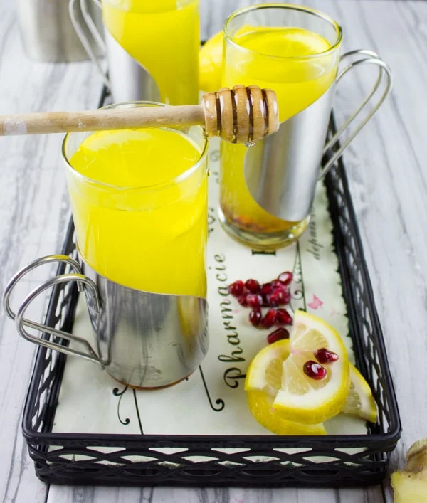 Soothing Lemon Ginger Turmeric Drink. The ultimate soothing and boosting drink to get you going! It's like a lemon ginger tea with the benefits of turmeric! get the recipe at foodallianceblog.com