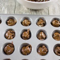 Caramel Spiked Chocolate Donut Holes. The best baked donut holes you'll ever make! tender, fluffy and intensely chocolate-y with a spike of caramel in the donut and glaze! Get the step by step recipe-foodallianceblog.com