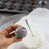 Caramel Spiked Chocolate Donut Holes. The best baked donut holes you'll ever make! tender, fluffy and intensely chocolate-y with a spike of caramel in the donut and glaze! Get the step by step recipe-foodallianceblog.com