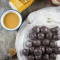 Caramel Spiked Chocolate Donut Holes. The best baked donut holes you'll ever make! tender, fluffy and intensely chocolate-y with a spike of caramel in the donut and glaze! Get the step by step recipe-foodallianceblog.com
