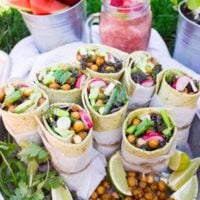 Best Roasted Chickpeas Wrap. Seriously the BEST. Fire Smokey Roasted Chickpeas layered on kale, avocados, radishes, scallions and a tortilla! Get the step by step and my secret sauce which bursts this wrap with flavor! foodallianceblog.com