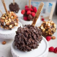 Homemade Ice Cream Pops. the BEST treat for kids and grown ups is here! Creamy Vanilla Ice cream, swirls of peanut butter, chunks of chocolate dipped cones and all coated in chocolate with more chocolate chips! Step by Step and Recipe at foodallianceblog.com