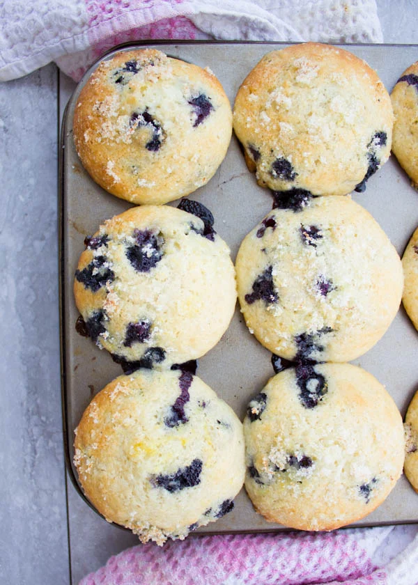 Overhead-shot of oven warm Blueberry Muffins with Lemon Sugar Crunch Topping