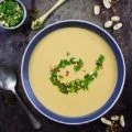 Creamy Peanut Soup with Peanut Crunch Herb Pistou. Authentic African recipe that my family picked up a long time ago, and we've been making/sharing it since then! It's pure peanut LOVE in every sip! foodallianceblog.com
