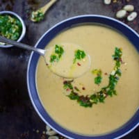 Creamy Peanut Soup with Peanut Crunch Herb Pistou. Authentic African recipe that my family picked up a long time ago, and we've been making/sharing it since then! It's pure peanut LOVE in every sip! foodallianceblog.com