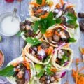 Spicy Harissa lamb shoulder chunks in pita cones with Tahini sauce. A serious Crowd Pleaser that's Loaded with Flavors and a Secret Tip for charring Lamb Chunks I learned form my grandma! Get the recipe and Step by Step at foodallianceblog.com