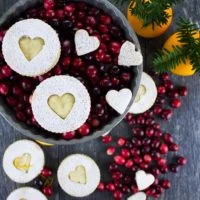 Holiday Maple Linzer Cookies. This delicious twist on a delicious cookie is the BEST! Bake a huge batch of these, they disappear fast! foodallianceblog.com
