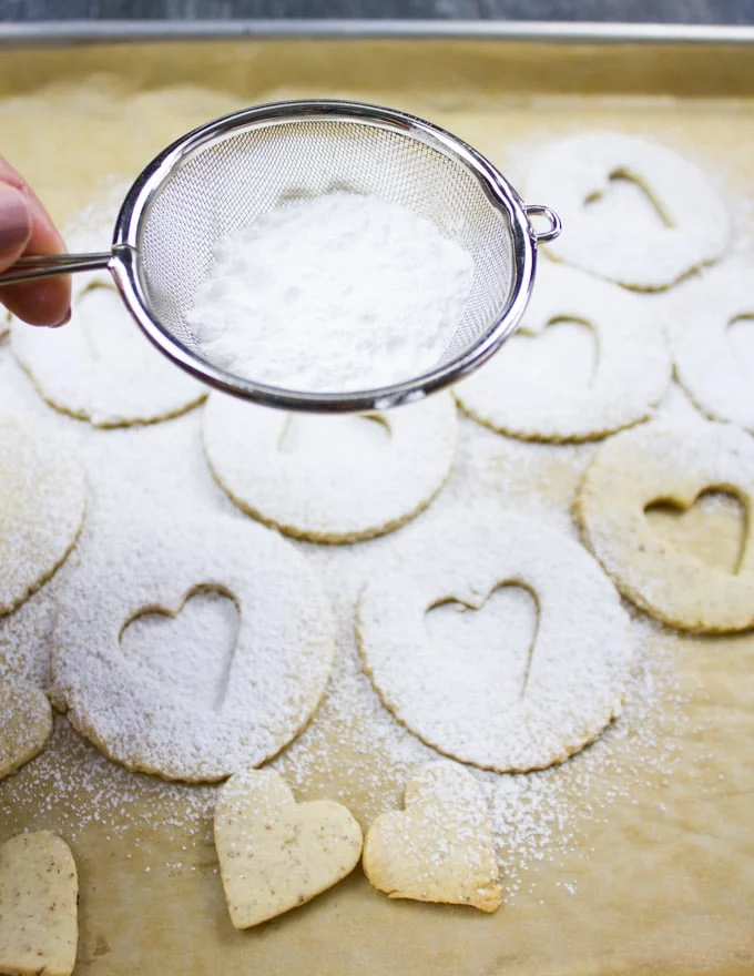 Holiday Maple Linzer Cookies. This delicious twist on a delicious cookie is the BEST! Bake a huge batch of these, they disappear fast! foodallianceblog.com