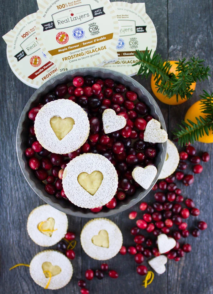 Holiday Maple Linzer Cookies. This delicious twist on a delicious cookie is the BEST! Bake a huge batch of these, they disappear fast! foodallianceblog.com