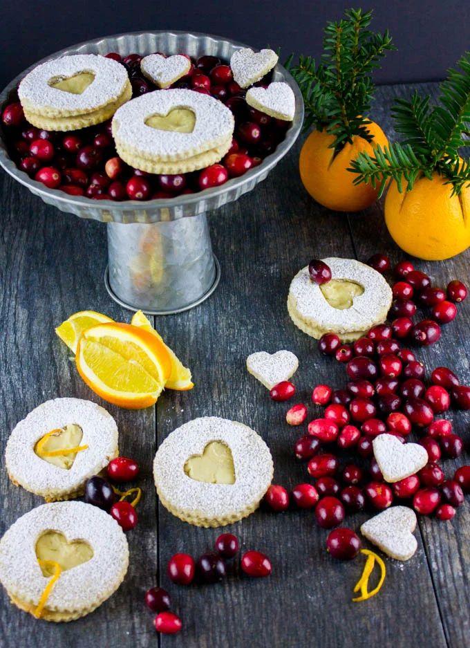 Holiday Maple Linzer Cookies. This delicious twist on a delicious cookie is the BEST! Bake a huge batch of these, they disappear fast! foodallianceblog.com