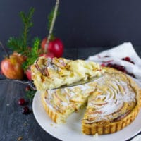 Swiss Apple Tart Recipe. This dreamy creamy apple tart is noting like your average apple tart. It's a flakey crust, studded with with apples, all drenched in a dreamy vanilla custard. Recipe at foodallianceblog.com