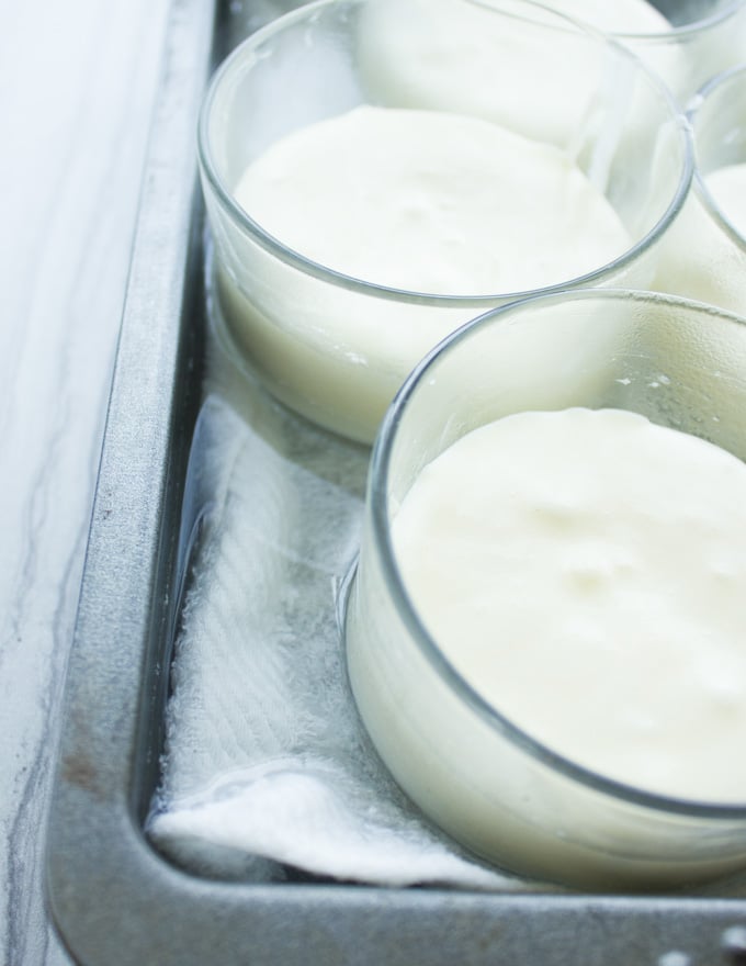Lemon Pudding Cake batter in dessert cups ready to bake