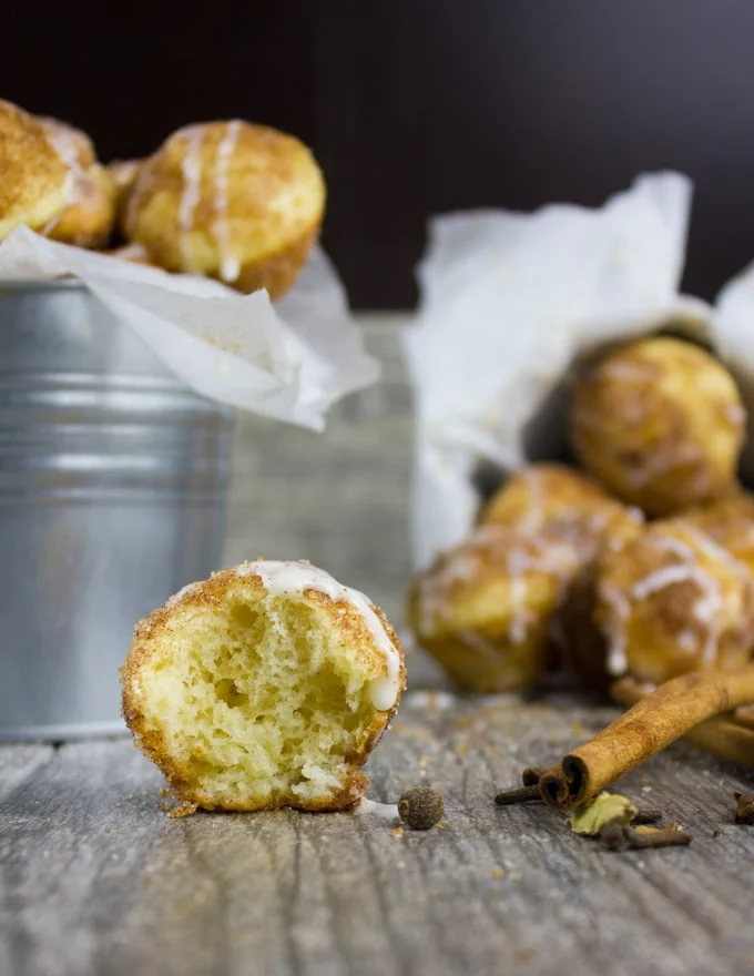 Baked Donut Holes with Cinnamon Sugar and Vanilla Glaze. The quickest most divine way to enjoy some donut comfort!