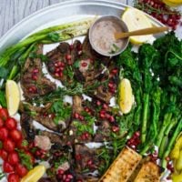 Grilled Lamb Chops with Black Olive Herb Butter | a no-fail recipe for perfectly cooked lamb chops on the grill. No marinade necessary! Served with grilled rapini and blistered tomtaoes it makes for an easy lowcarb and paleo meal for festive occasions. | foodallianceblog.com | #grilled, #lamb, #easy, #lowcarb, #keto, #healthy, #protein, #bbq, #dinner