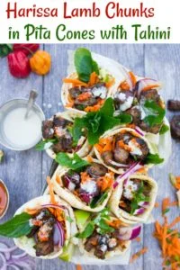 Spicy Harissa Lamb Pita Cones with Tahini Sauce | diced lamb shoulder seared with plenty of garlic and olive oil until charred and tender then seasoned with a fresh pepper Harissa sauce and piled into a homemade pita bread pocket. | foodallianceblog.com | #homemade, #easy, #bbq, #spicy, #pita, #pockets, #seared, #protein