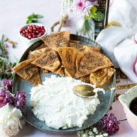 Finished labneh spread on a plate and ready for the topping