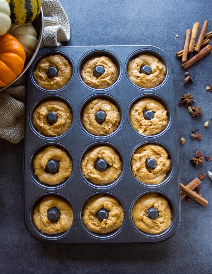 baked donut pan ready filled with batter and ready for the oven